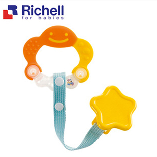 Richell 固齒器橘黃色附固定夾示意圖